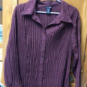 Woman’s pleated blouse